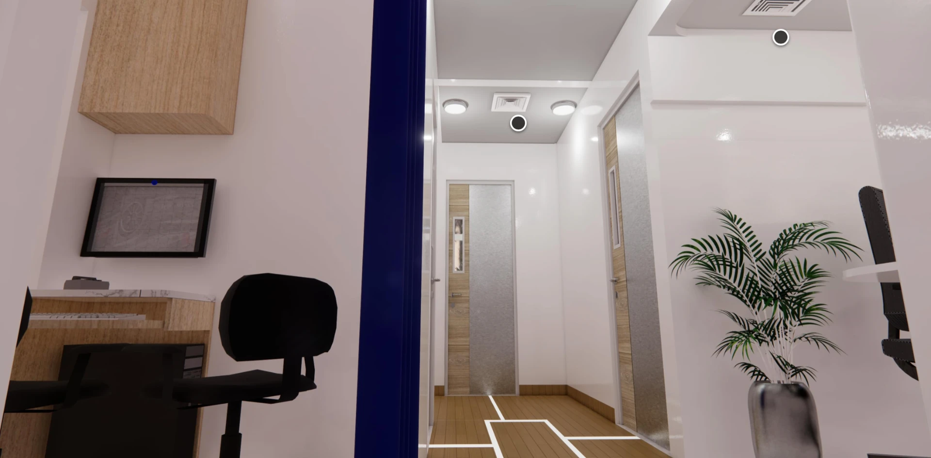 Pasillo corporativo iluminado con rejillas Maier alineadas en techo